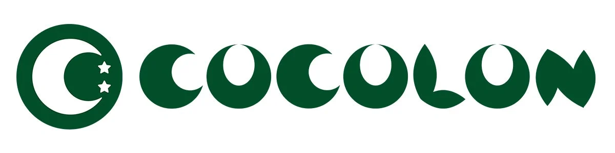 「COCOLON」という文字と三日月、二つの星を組み合わせた緑色のロゴマークです。円形のエンブレムと独特のフォントが特徴的です。